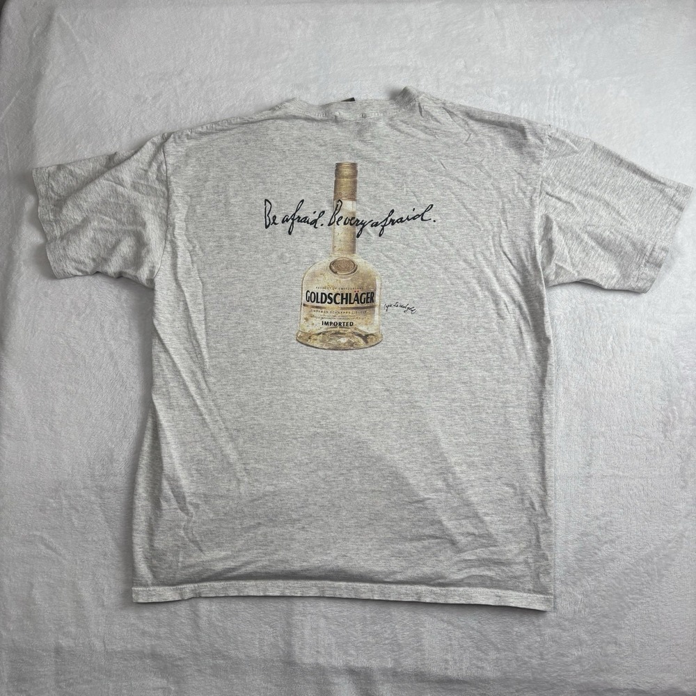 VTG Goldschlager Be Very Afraid Grey Short Sleeve Graphic Alcohol Promo Shirt XL